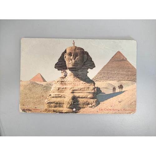 194 - Carton containing over 400 early 20th century postcards mostly of British and world topographical su... 