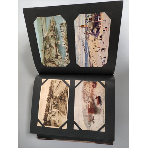 204 - Album containing over 300 early 20th century postcards mostly of British topographical views such as... 