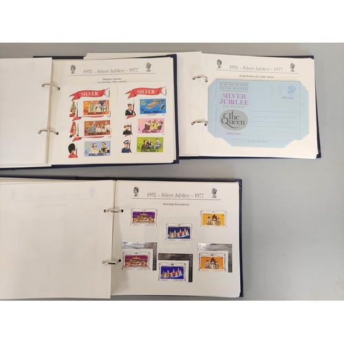 183 - Three postage stamp albums relating to Queen Elizabeth II Silver Jubilee 1977 to include British &am... 