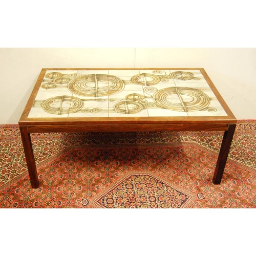 371 - Danish retro coffee table, with a tiled top, 72cm high and 122cm wide.