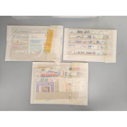 186 - Box of world and British Commonwealth postage stamps mostly sealed and unissued.&nbsp;