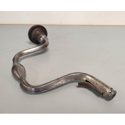 220 - Two Victorian steel hand drills with hard wood hand rests. The first by Buck is stamped W.R Hide tow... 