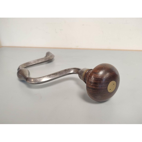 220 - Two Victorian steel hand drills with hard wood hand rests. The first by Buck is stamped W.R Hide tow... 