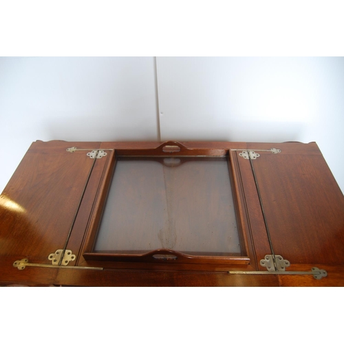 343 - 'The Eclipse' patent mahogany cocktail/drinks cabinet, patent no. 15398, the two-division top openin... 