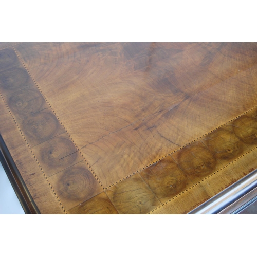 352 - Walnut inlaid desk in the William & Mary taste, decorated all over with oyster walnut-style pane... 