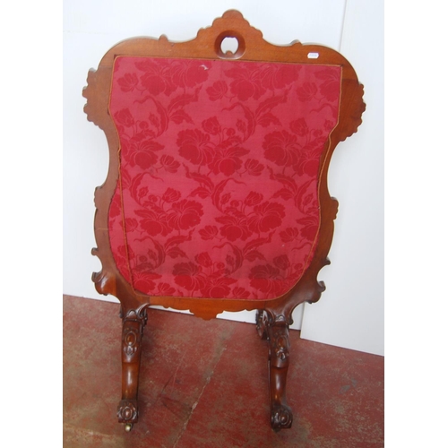 353 - Victorian mahogany fire screen, with a needlepoint panel to the centre depicting flowers in a vase, ... 