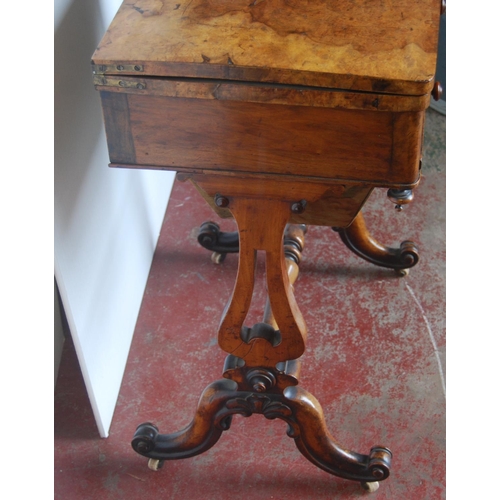 362 - 19th century walnut games table, the swivel fold-over top enclosing a satinwood and ebony chess boar... 