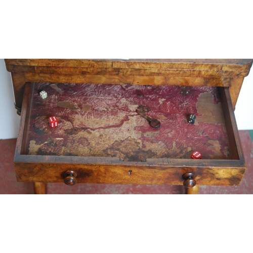 362 - 19th century walnut games table, the swivel fold-over top enclosing a satinwood and ebony chess boar... 