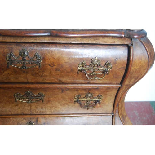 367 - Early 19th century Dutch walnut bombé chest of four graduated drawers, on ball and claw feet, 78cm h... 