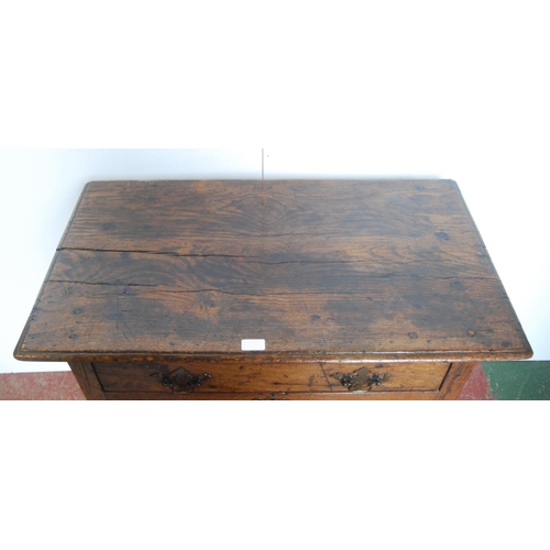 368 - George III oak lowboy, the rectangular plank top above a long drawer and shaped apron, on turned sup... 