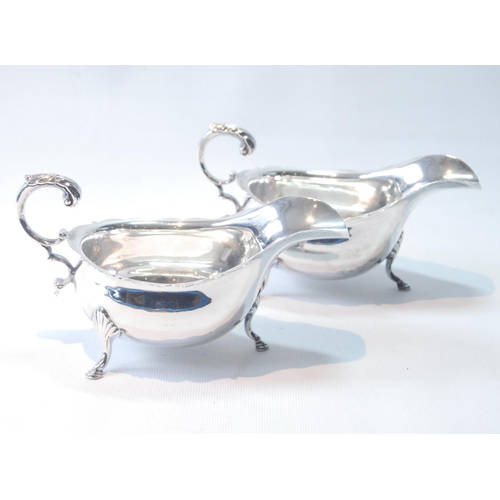 26 - Pair of silver sauce boats of mid-18th century-style with scroll handles, by Hamilton & Inches, ... 