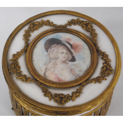 139 - French-style ormolu and ceramic musical jewellery box, the cylindrical box with a classical female p... 