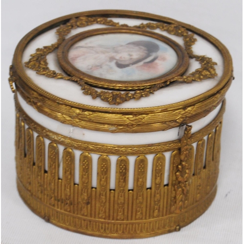 139 - French-style ormolu and ceramic musical jewellery box, the cylindrical box with a classical female p... 