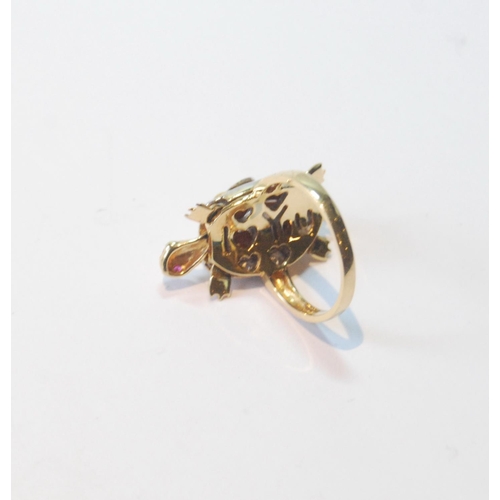 56 - Coloured gold dress ring modelled as a turtle with ruby eyes and diamond-bordered shell and moveable... 