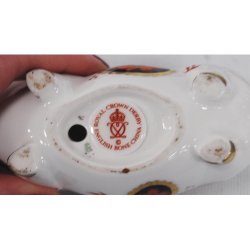 180 - Four Royal Crown Derby paperweights modelled as an owl, pig, bird and a fox, stopper to the undersid... 