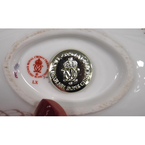 181 - Four Royal Crown Derby animal paperweights modelled as a teddy bear, owl, duck and a swan, stopper t... 