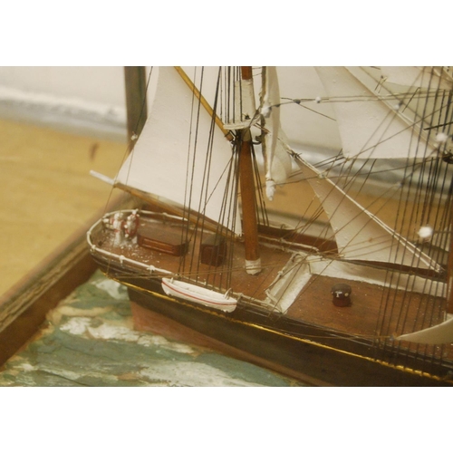 148 - Late Victorian model of a clipper enclosed in a mahogany glazed display case, overall 57cm high, 80c... 