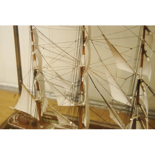 148 - Late Victorian model of a clipper enclosed in a mahogany glazed display case, overall 57cm high, 80c... 