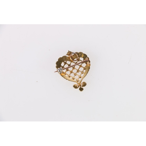 103 - 15ct yellow gold combination pendant or brooch of heart form set with seed pearls, likely late Victo... 