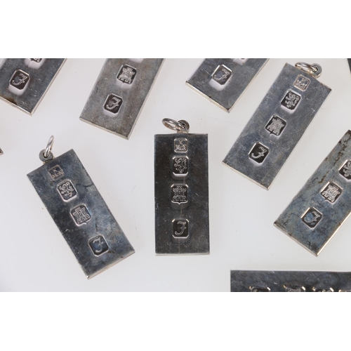 106 - Twenty-two contemporary silver ingot pendants by Kenneth McNeill of Carlisle, fully hallmarked ... 