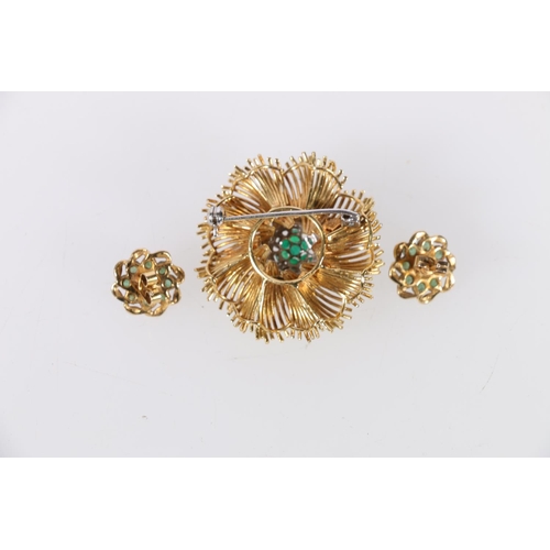 117 - 18ct yellow gold emerald set flowerhead brooch, 13.2g, and a pair of emerald and pearl set earrings,... 