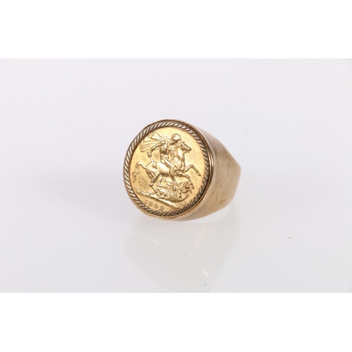 160 - Sovereign ring set in 9ct gold band, the sovereign dated 1908, size R , 17.7g gross.