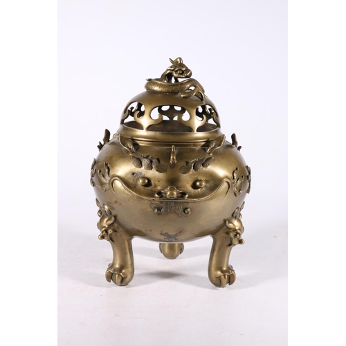 355 - Large Chinese brass censer on triple ball and claw supports with lion mask surmounts, the body decor... 