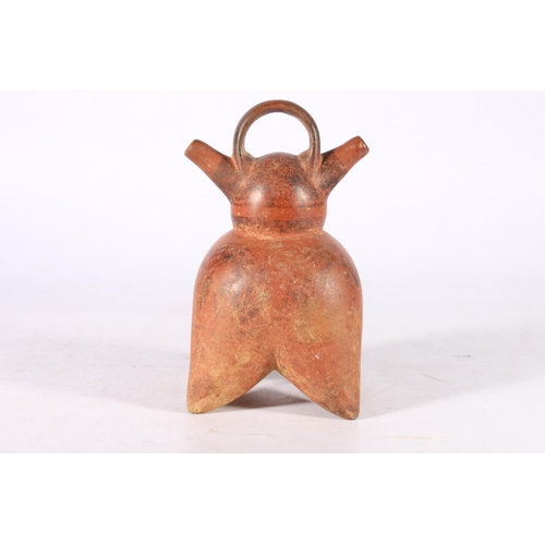 390 - Peruvian Chimu pottery double spouted stirrup jar, with spherical top and body on four pointed pap s... 