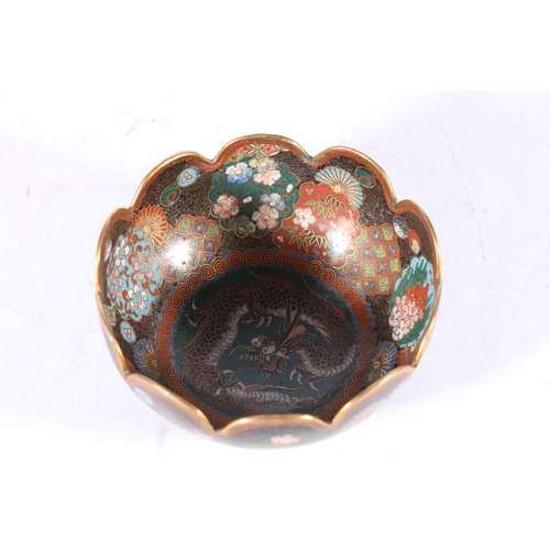 392 - A Japanese cloisonne bowl with petal edge and gilt metal wires, decorated with various shaped panels... 