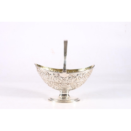 54 - Antique sterling silver swing handled basket of navette shape with gilded interior and heavy foliate... 