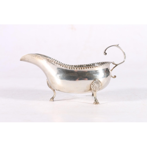 64 - 18th Century sterling silver cream jug or sauce boat, probably Robert Prinkley and Robert Scott II, ... 