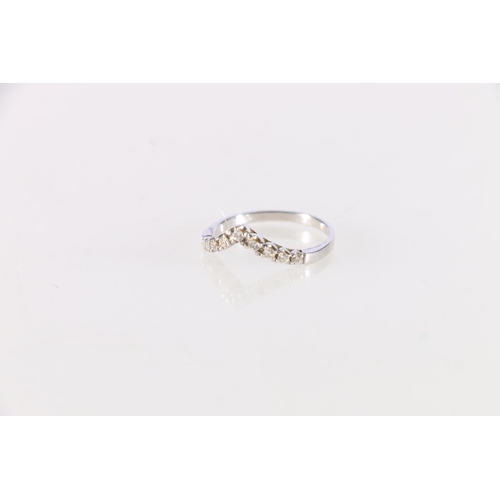 84 - 18ct white gold nine stone eternity ring, makers mark rubbed, stamped '750', size Q, 2.6g.