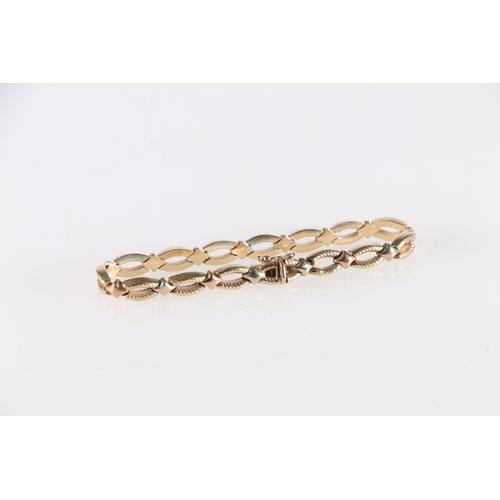 90B - 9ct yellow, rose and white gold bracelet with rope textured links, the clasp stamped '375', 11.2g.