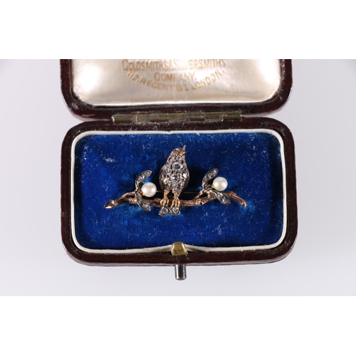 90G - Good Victorian or later bar brooch modelled as a bird on a branch set with rubies to the eyes and in... 