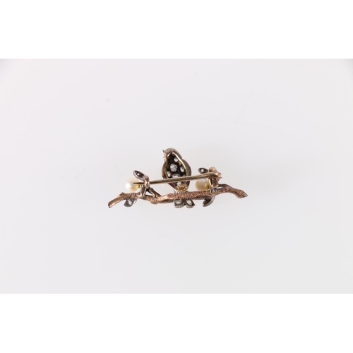 90G - Good Victorian or later bar brooch modelled as a bird on a branch set with rubies to the eyes and in... 