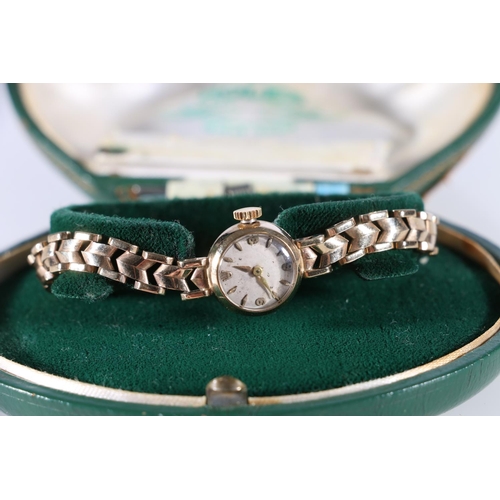 90R - Ladies 9ct gold Rolex wristwatch having 9ct gold Rolex bracelet and Rolex box.