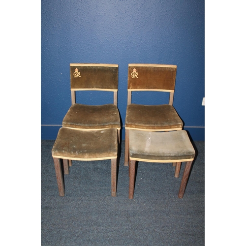 573 - Pair of limed oak George VI Coronation chairs with matching footstools stamped 'Maple and Co'. (4)