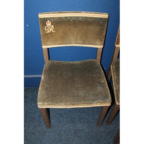 573 - Pair of limed oak George VI Coronation chairs with matching footstools stamped 'Maple and Co'. (4)