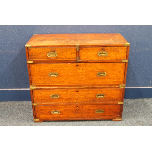 574 - Antique brass bound teak military campaign chest of typical form of two sections having recessed han... 