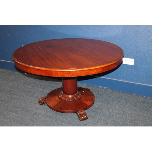 579 - Antique mahogany tilt top breakfast table of circular form raised on column with platform base upon ... 