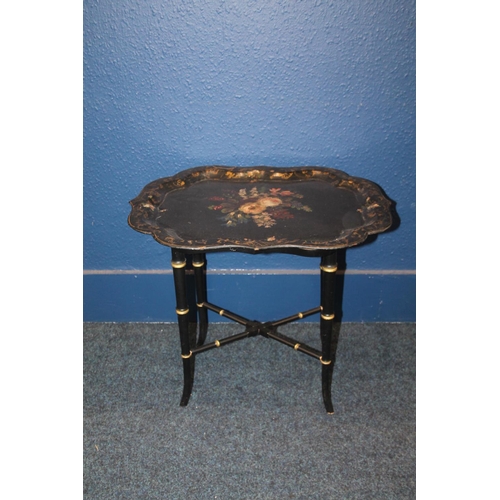 580 - Victorian painted papier mache tray top table on stand, 63cm wide.