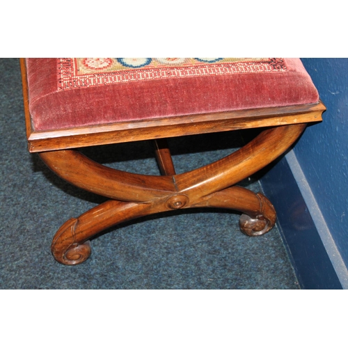 588 - Antique X frame footstool, the rectangular top covered with tapestry panel, 55cm long. 