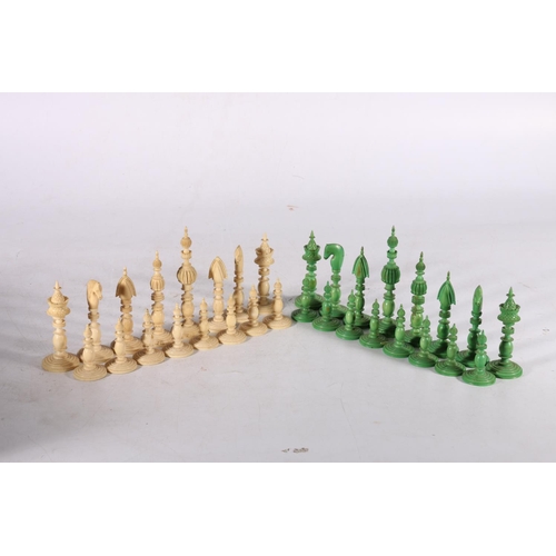 344 - A mid 19th century Indian ivory Pepys style chess set, part stained green, complete and nicely carve... 