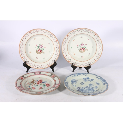 378 - Four 18th century Chinese porcelain dishes, a pair decorated in famille rose colours with wavy folia... 