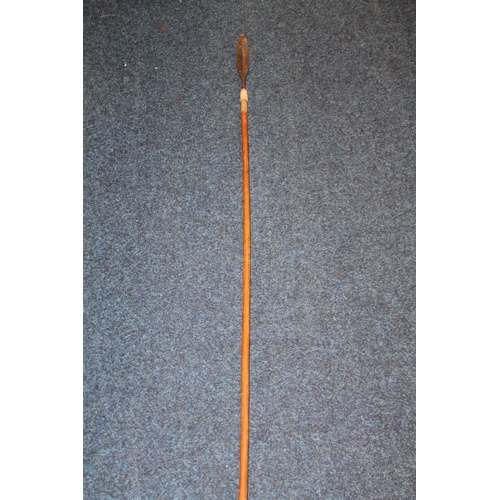 397 - African lion spear, probably Maasai, with double edged leaf shaped blade, 151cm long.