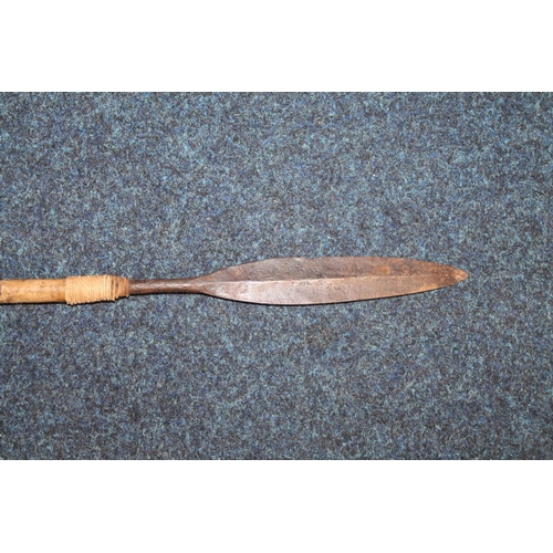 397 - African lion spear, probably Maasai, with double edged leaf shaped blade, 151cm long.