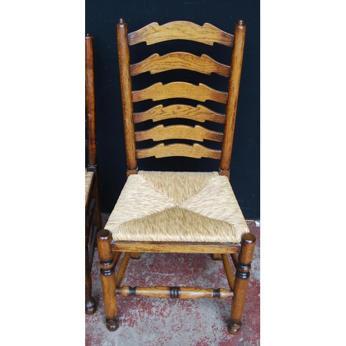 356 - Set of eight near-matching Lancashire-style ash and elm country chairs, each with a shaped ladder ba... 