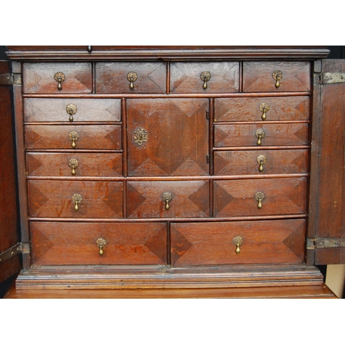 358 - Early 18th century Queen Anne walnut cabinet on chest, the cabinet top with a long drawer above two ... 