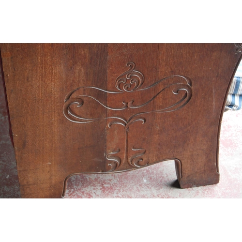 359 - 19th century continental carved oak hall bench decorated with carved floral, fruit, vine and acanthu... 