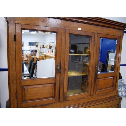 375 - George III oak cabinet on dower chest (formerly a livery cupboard), the glazed door enclosing velour... 